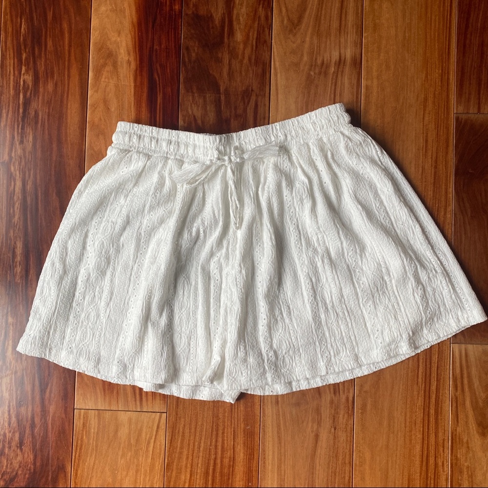 White textured shorts with tassel drawstrings, size 6